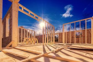 A new home being constructed with frames exposed to the sky.